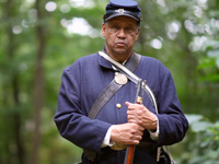 Mel Reid is an African American civil war reenactor with the Massachusetts 54th Company B.