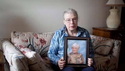 AARP Minnesota voter ID law woman with picture of mother