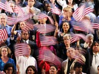 Group of people waiving American Flags, What issues matter to older voters in the 2012 Presidential Election