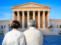 Couple standing before the Supreme Court - a preview of cases coming before SCOTUS in 2011-12 that will affect people over 50