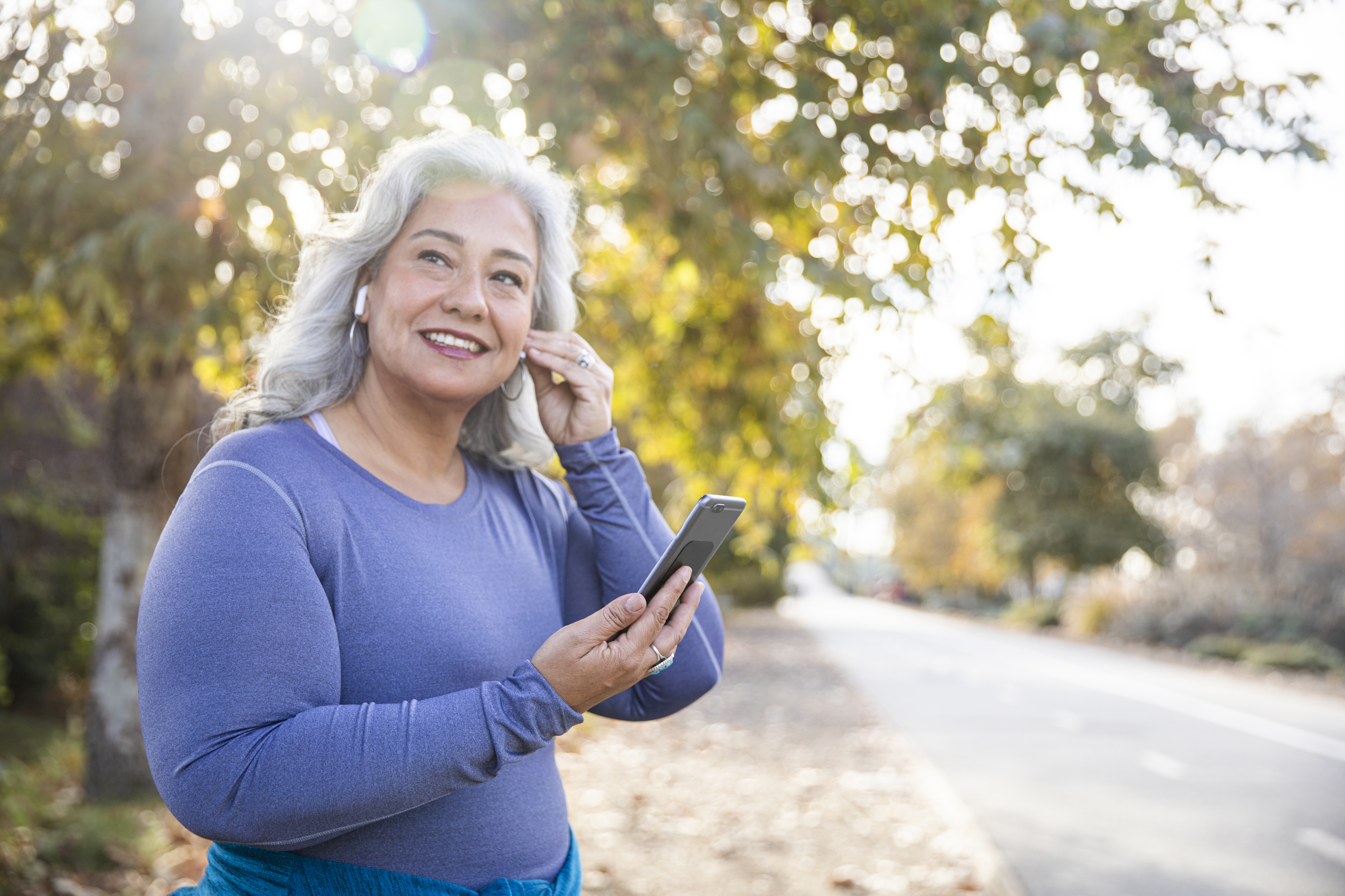Woman listening to a podcast