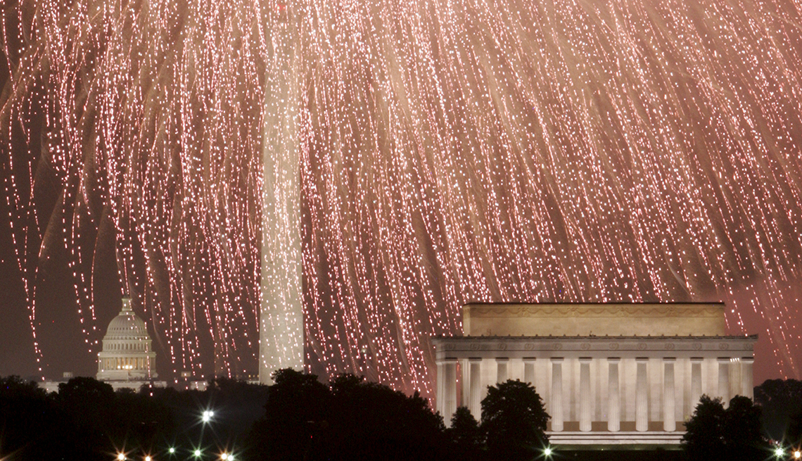 item 2 of Gallery image - Fireworks explode over Washington, D. C. Showing U.S. Capitol, Washington Monument and Lincoln Memorial, Best Fireworks Displays