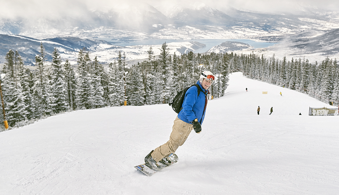 T.R. Reid snowboarding on a Colorado mountaintop 