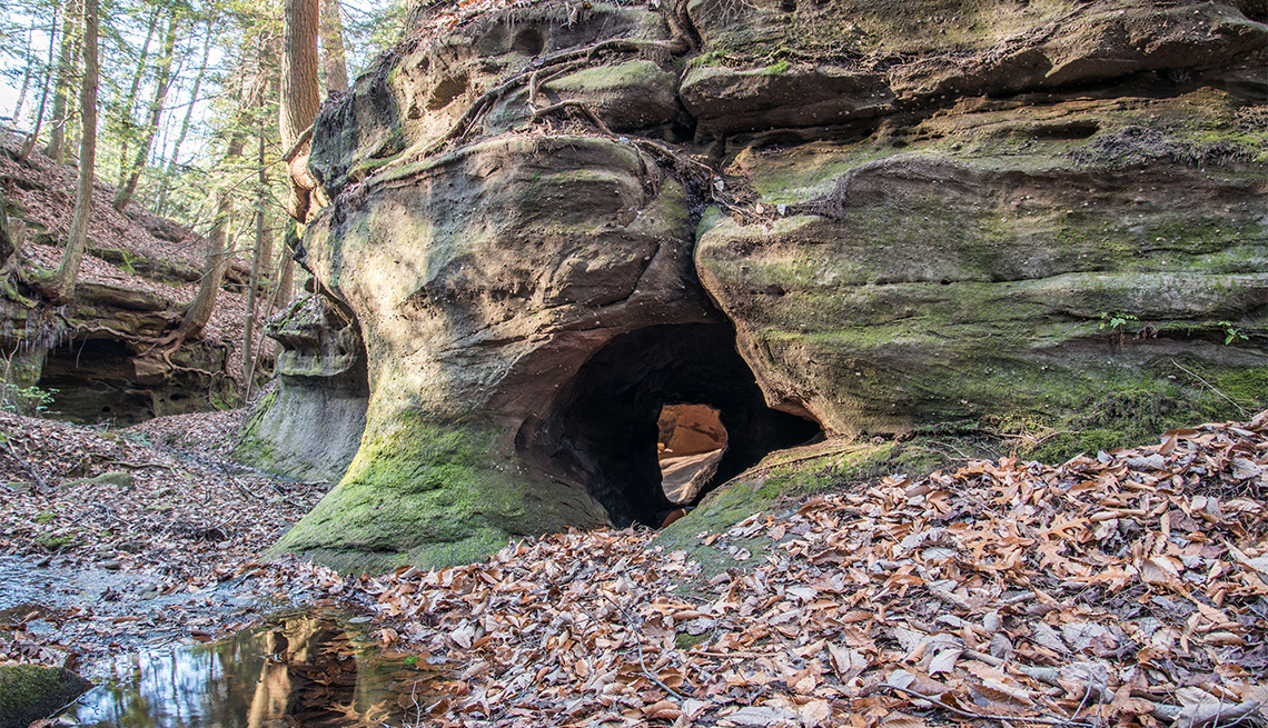 item 6 of Gallery image - A sandstone arch in a creek bed at Mammoth Cave National Park