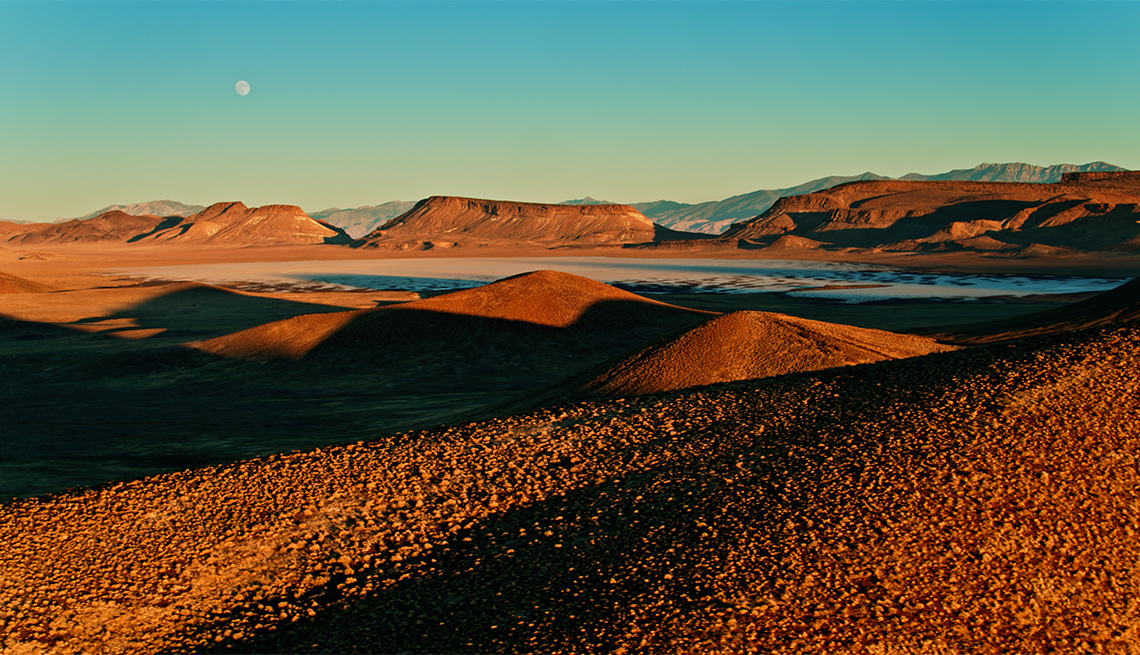 Aerial shot of Lunar Crater National Natural Landmark, a volcanic field in Nye County, Nevada, at sunset.
