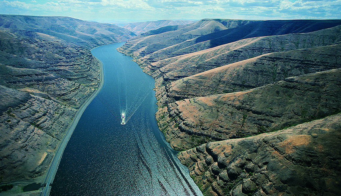 item 1 of Gallery image - Dry Folded Hills, Bright Blue River, Barge, 5 American River Cruises