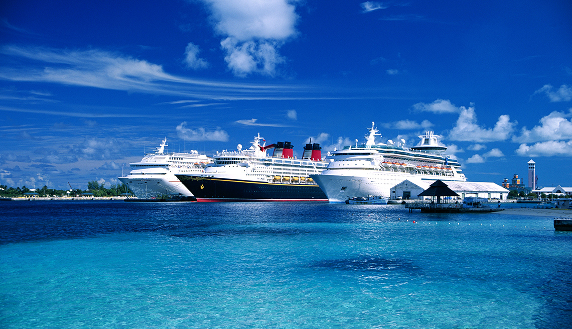 three cruise ships docked in the Bahamas