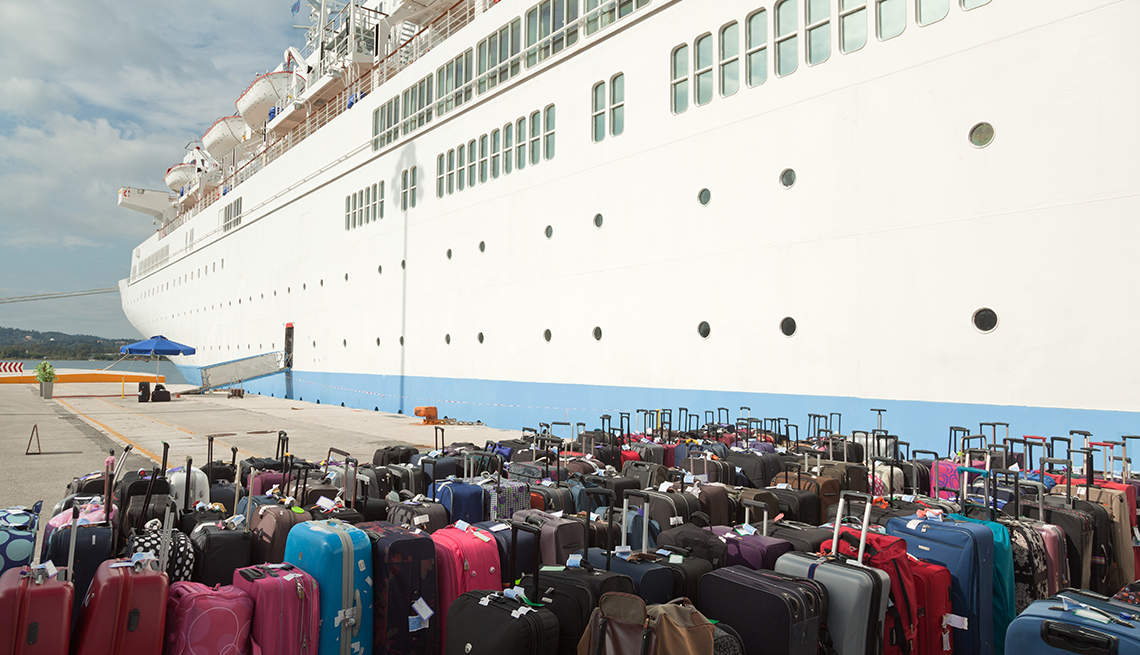 luggage outside of a cruise ship at pier