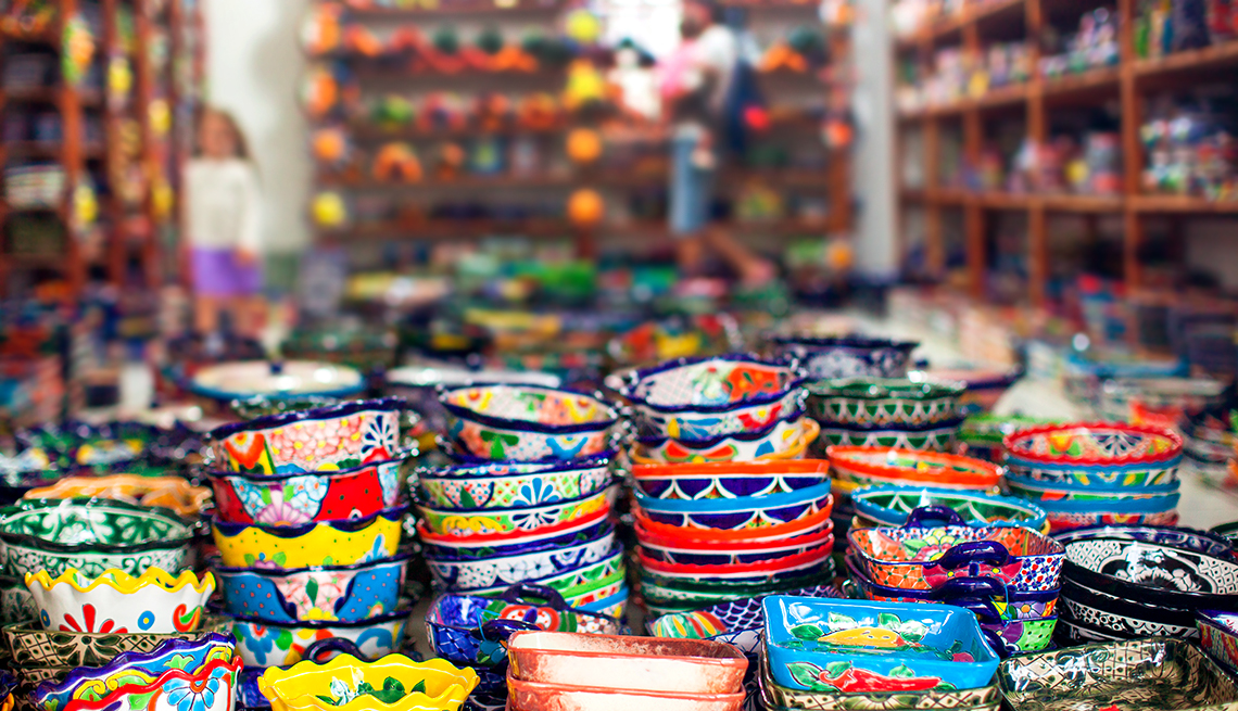 item 10 of Gallery image - colorful pottery for sale in a shop 