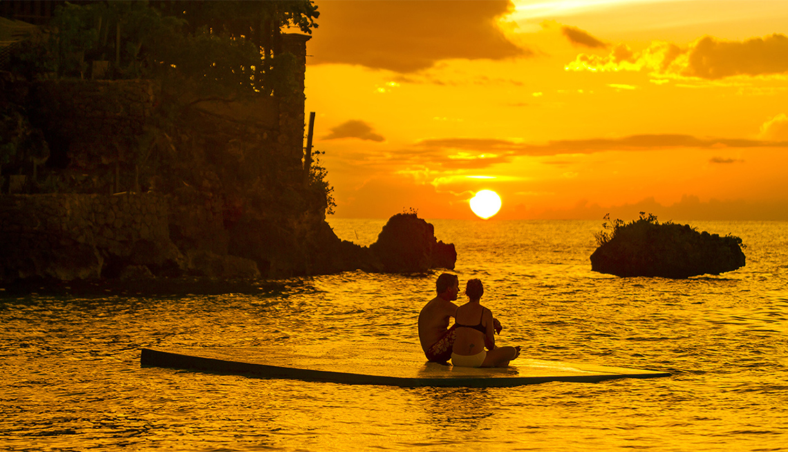 Couple Watching Sunset off Ocho Rios, Jamaica, Caribbean Island Guide