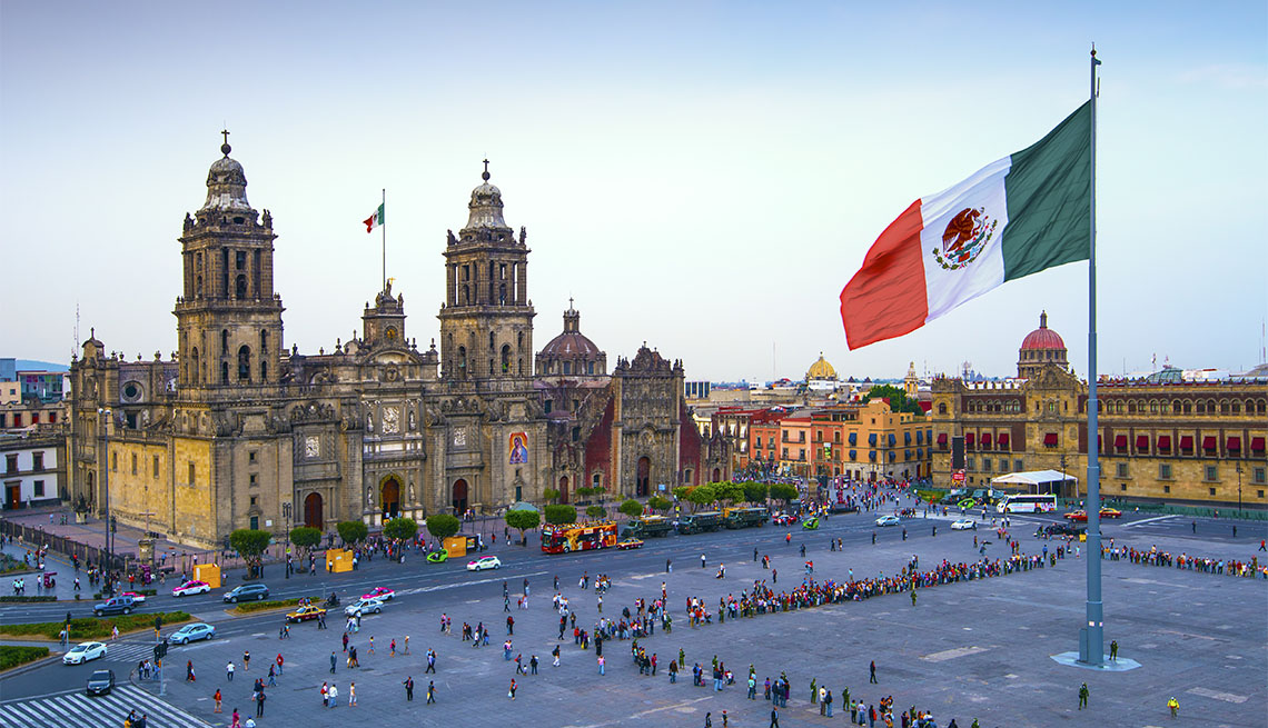 item 3 of Gallery image - The Mexican flag flies over the Zocalo, the main square in Mexico City