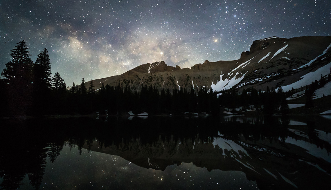 Stars reflecting in lake at 10,000 feet in Great Basin National Park