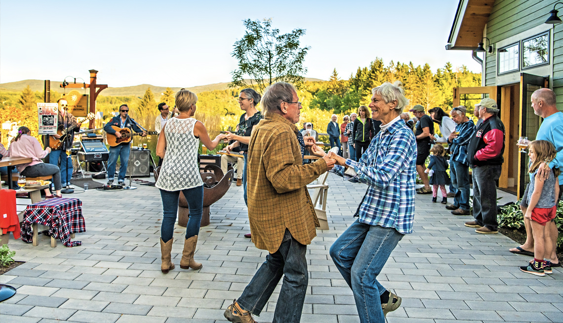 people dancing at a hill farmstead brewski in greensboro bend