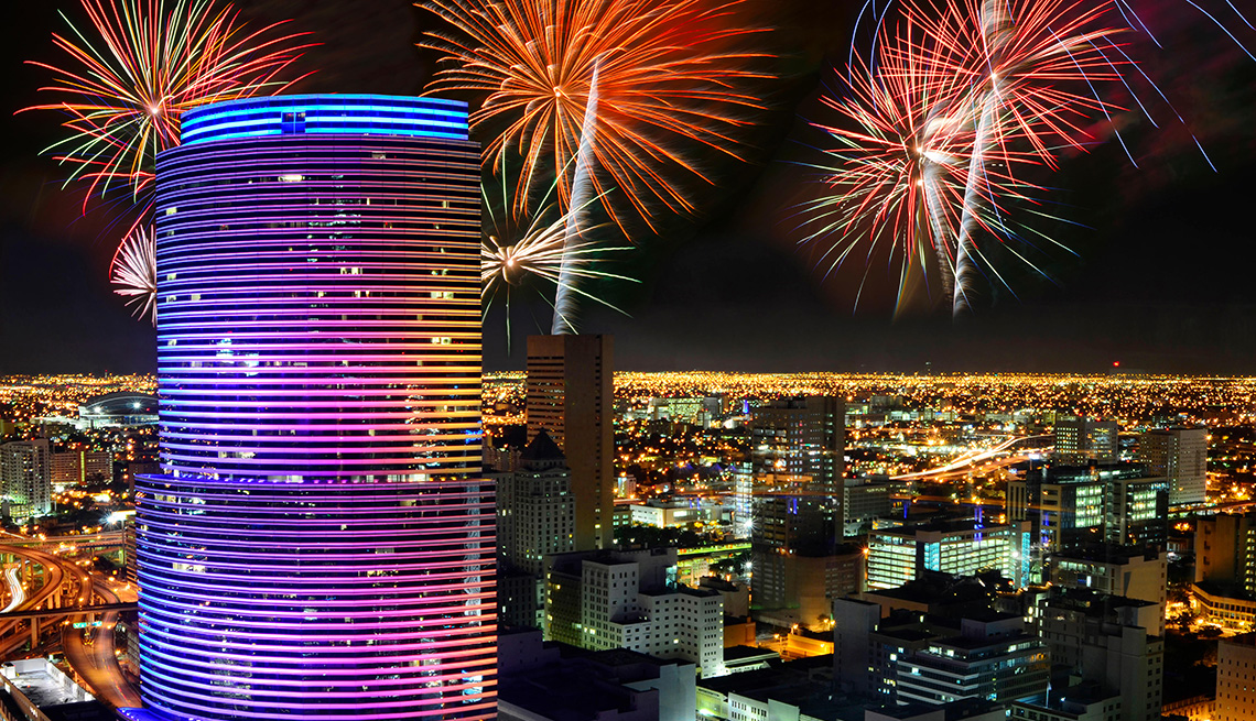 item 7 of Gallery image - View of the Miami skyline during a fireworks display.