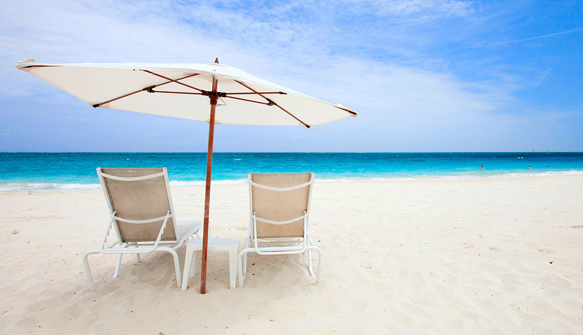 Beach Chairs And Umbrella On The Beaches In Cancun Mexico, Best Honeymoon Destinations