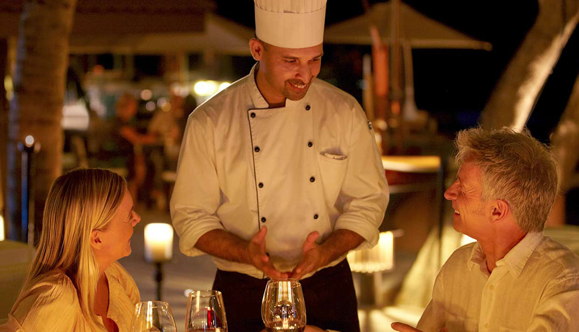 A Chef Greets Two Passengers At Dinner On Cruise Ship, Cruise Ship Myths