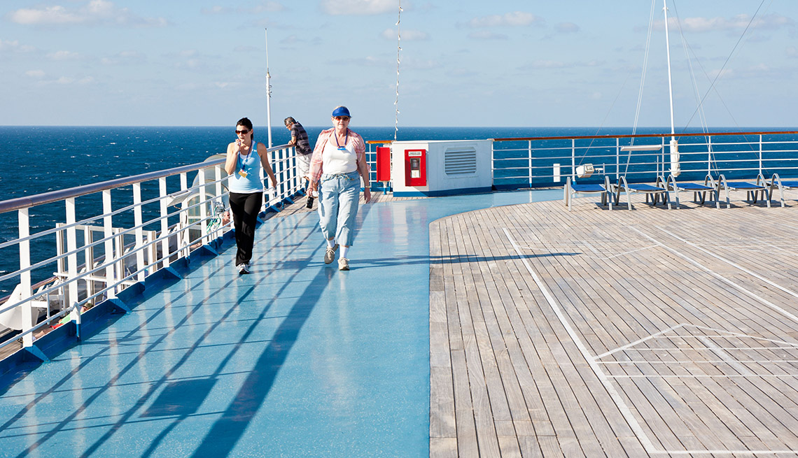 Two Ladies Take A Stroll On The Deck Of A Cruise Ship, Wellness Vacation