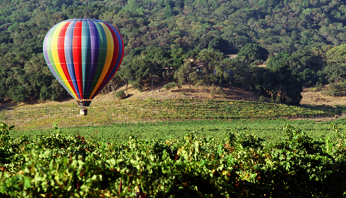 Hot-air Balloon Flying over Vineyard in Napa Valley, California, Long Weekend Getaway, Travel 