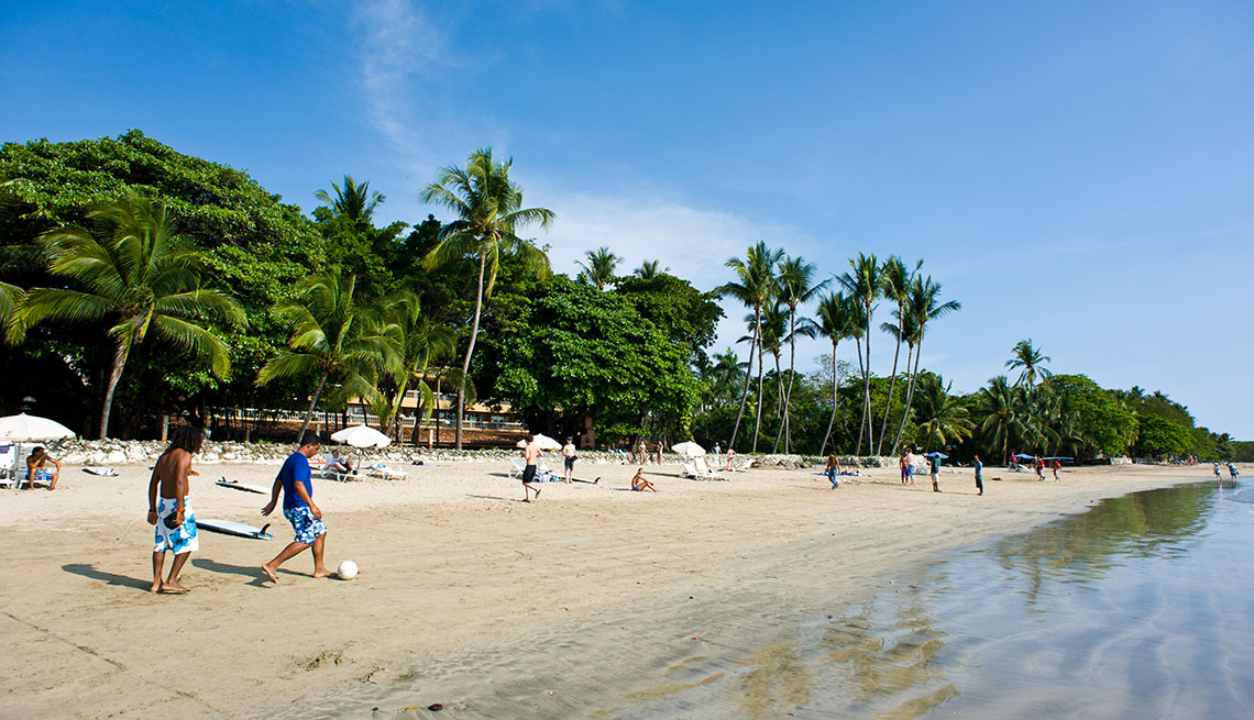 Beach Goers Play Soccer On The Beach In Papagayo In Costa Rica, World's Best Beaches