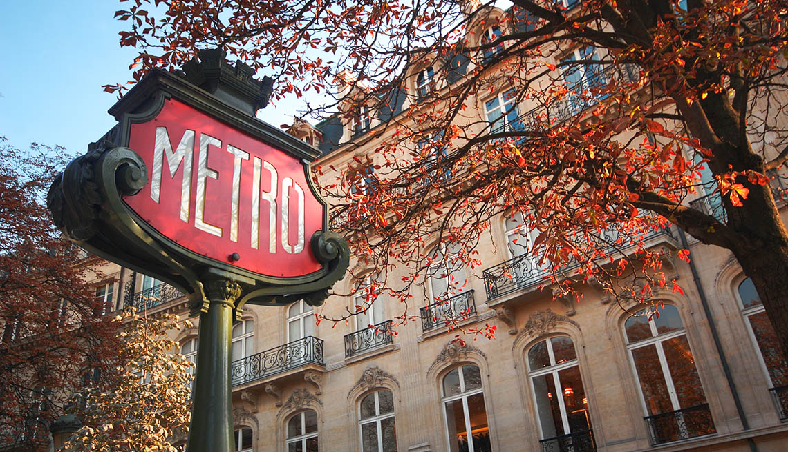 item 5 of Gallery image - A Classic Metro Sign In Front Of A Building In Paris France, Fall Vacations