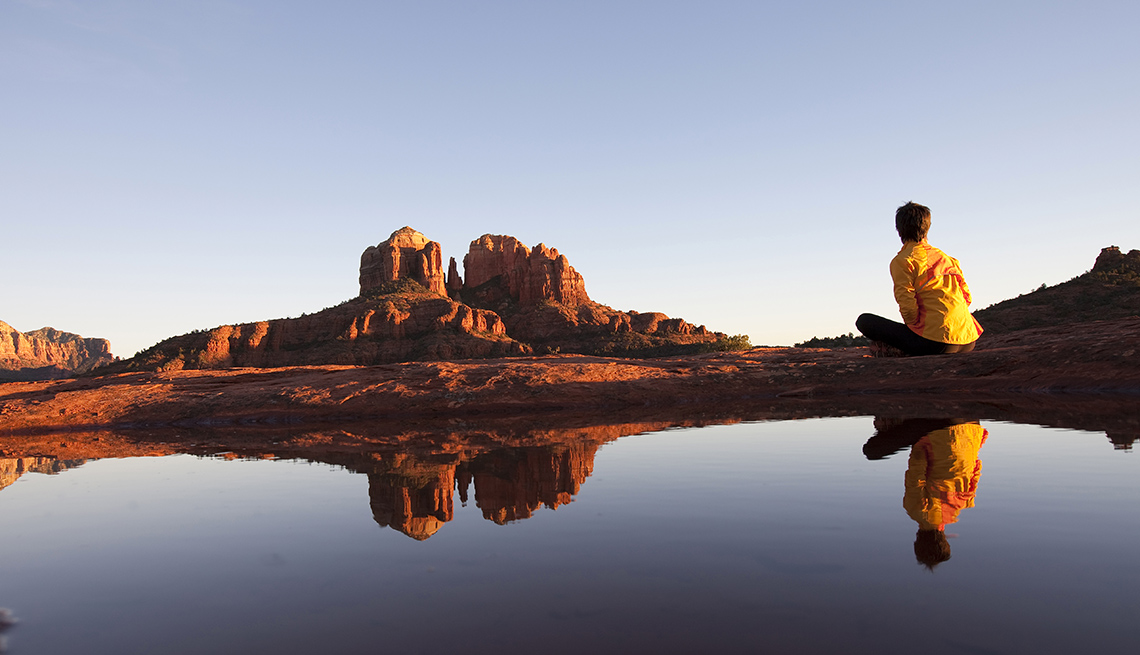 Woman Sits And Relaxes In Sedona Arizona, Wellness Vacation