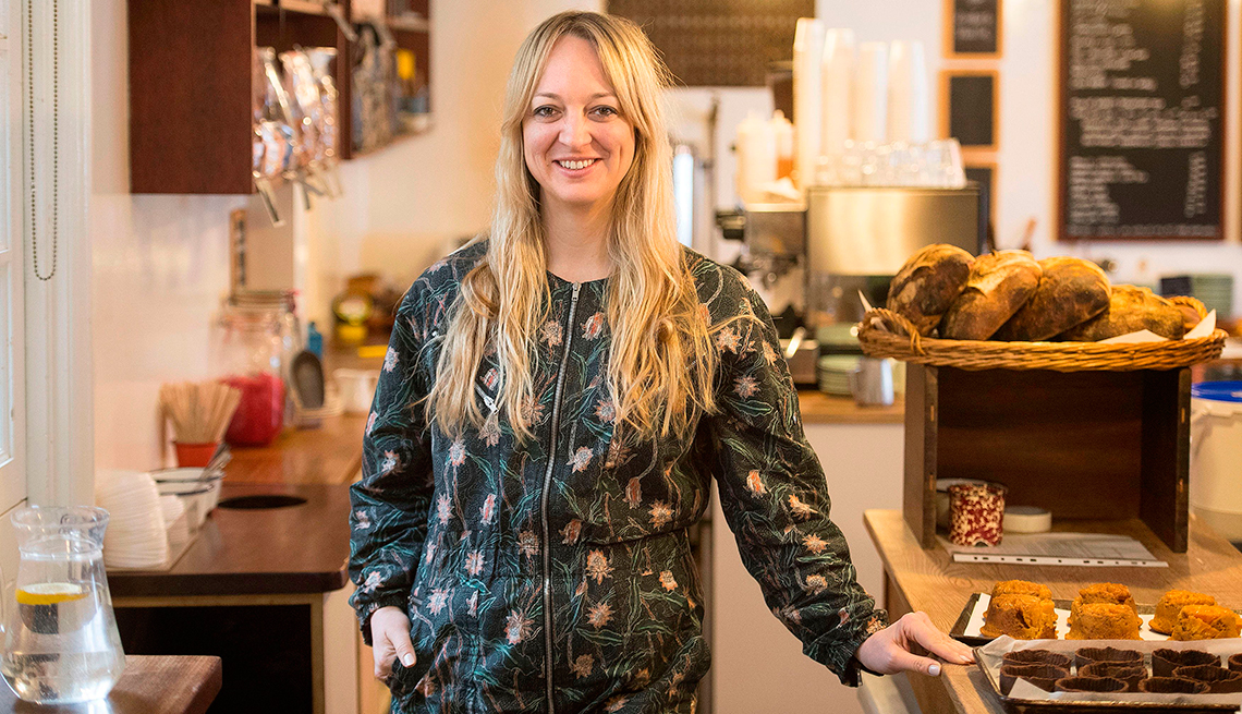 Baker Claire Ptak poses for a photgraph inside her bakery, Violet, in east London
