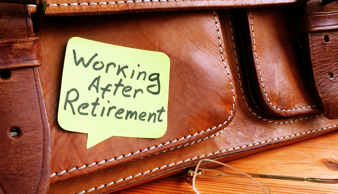 a yellow note that says working after retirement on a brown briefcase