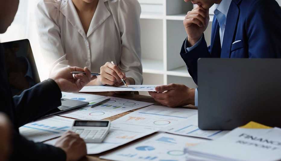 Group of Business People Meeting analysis financial plan, discussion, research with paperwork at office, accounting concept.
