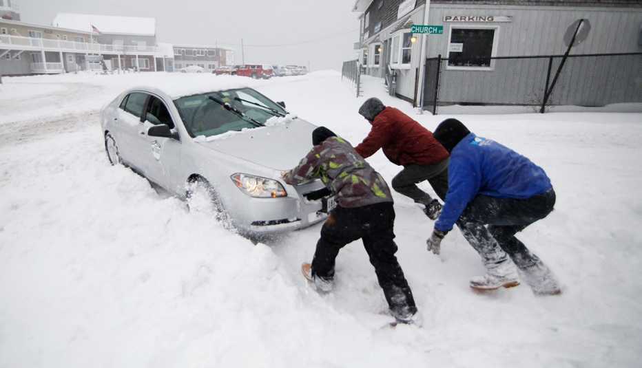 Winter Storms, Nick Buonanno, Braden Haskell, Kurt Wenzel help motorist stuck in snowbank, Wells, Maine, AARP Foundation, Disaster Relief Winter Storms, Nick Buonanno, Braden Haskell, Kurt Wenzel help motorist stuck in snowbank, Wells, Maine, AARP Foundation, Disaster Relief