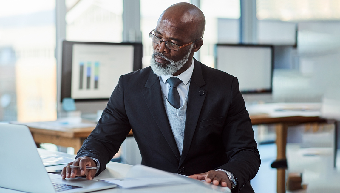 Older Man Working In Office