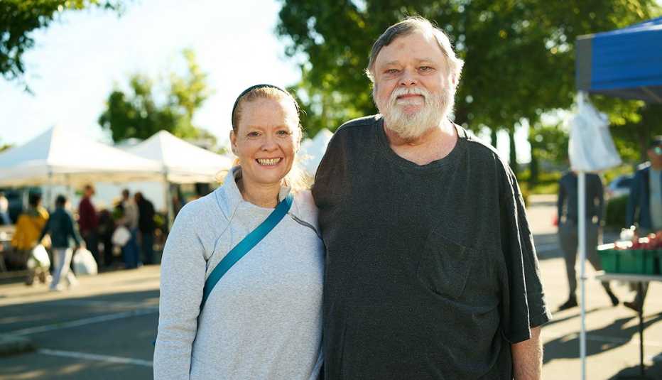 Tom McSpedden and Erika Murdoch standing outside of farmer's market Tom McSpedden and Erika Murdoch standing outside of farmer's market