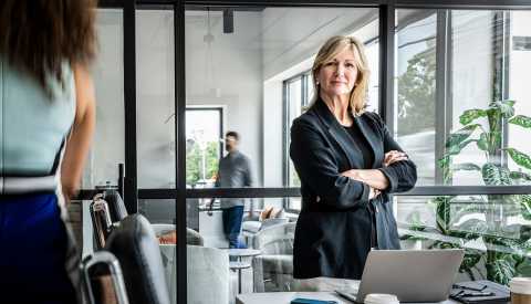 Older businesswoman in conference room