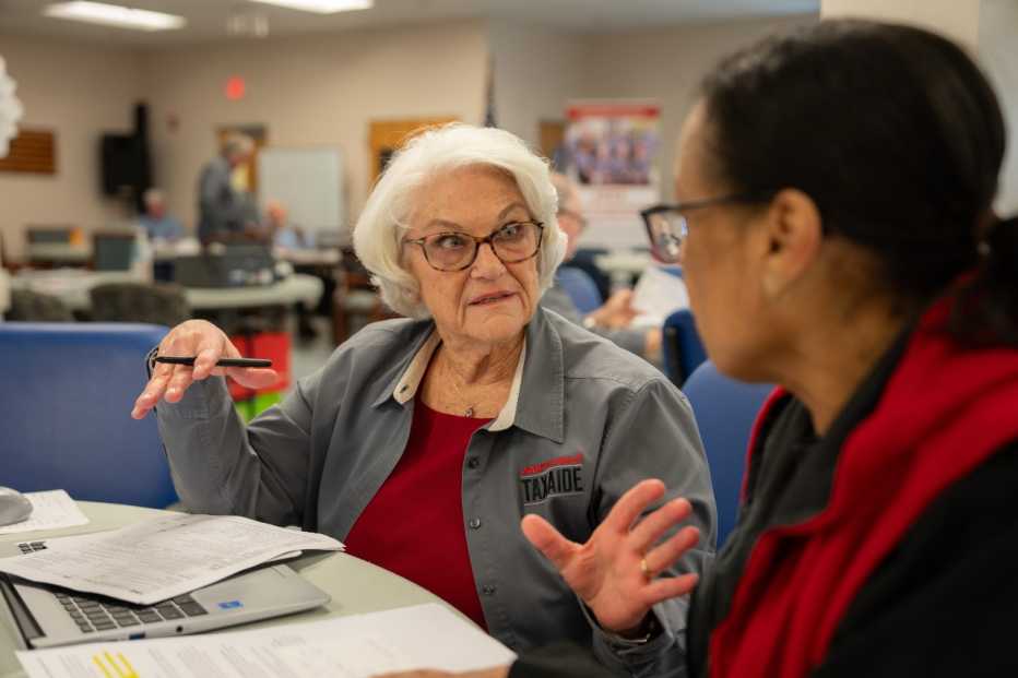 Charlotte Turner, AARP Foundation Tax-Aide volunteer prepares taxes for free at the Culpeper, VA Senior Center.
