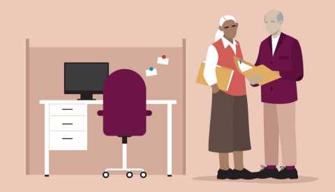 Older woman at the office with older white man holding folders