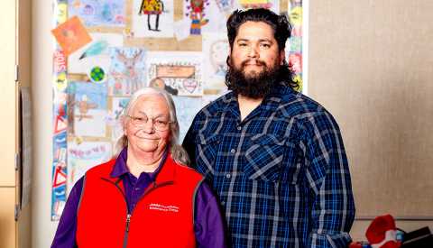 AARP Foundation Experience Corps Volunteer tutor Barbara Sundust with her son, Noah Sundust, who is a 3rd grade teacher at Desert Willow Elementary in Casa Grande, AZ