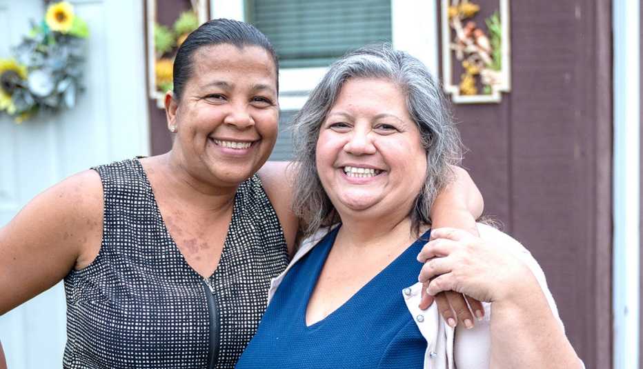 Jeannie Rubero, Director of Operations of Senior Services, Centro Hispano (right) with community member Niurka Almonte (left)