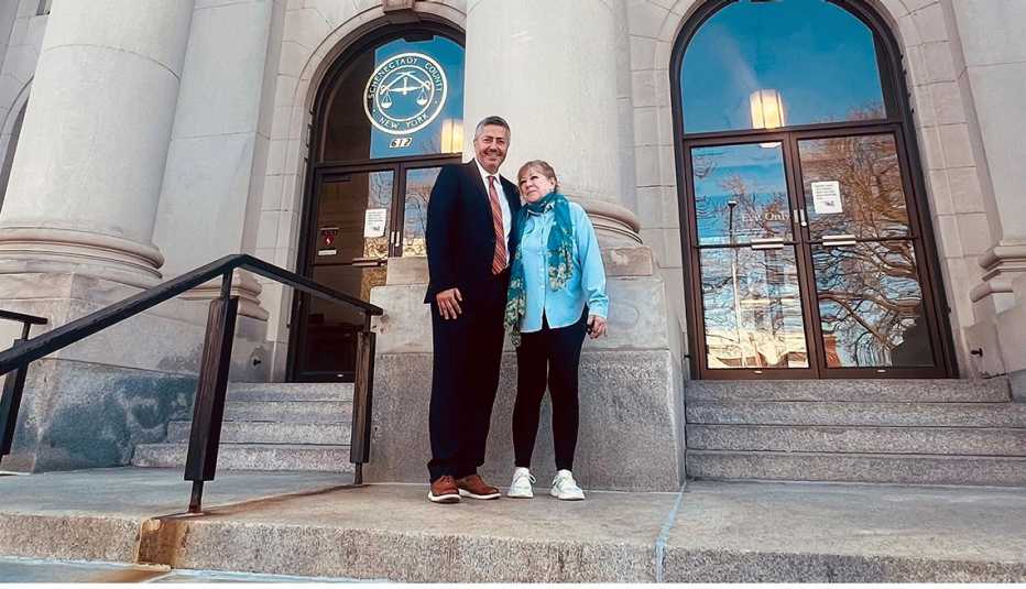 Mary Hartshorne with Foundation lawyer in front of the U.S. District Courthouse