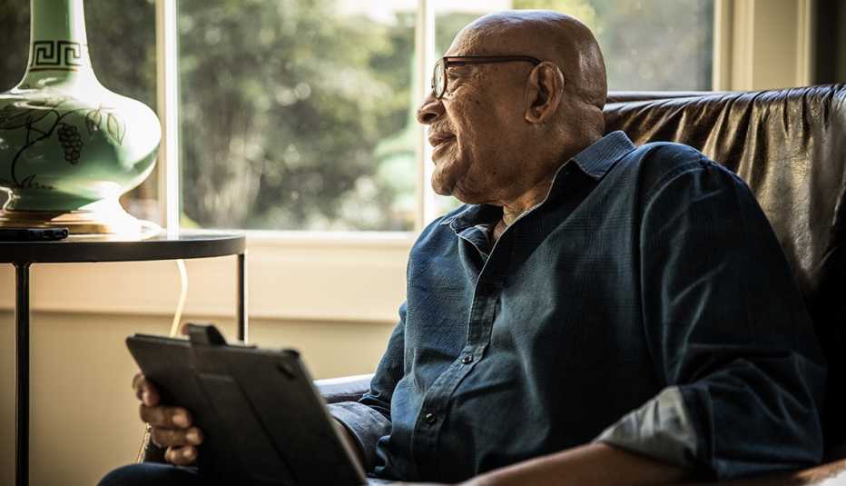 Older man using tablet