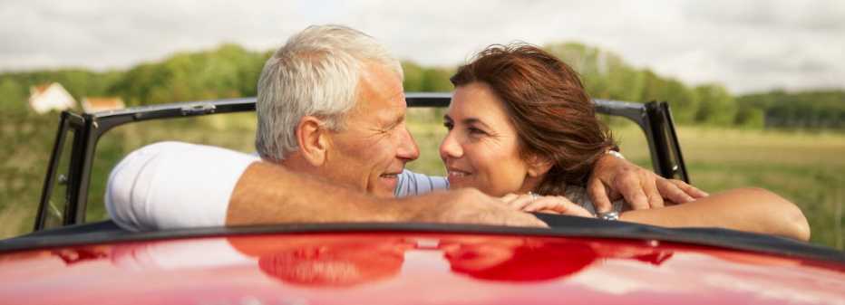 Couple in a convertible sports car