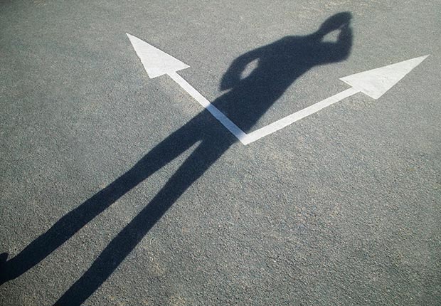 what we believe skeptical aliens ufo heaven hell zombies angels reincarnation ghosts astrology bigfoot apocalypse vampires poll stats belief shadow arrows scratch head wonder ponder confused (Paul Hardy/Corbis)