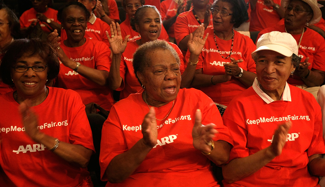 aarp volunteers clapping