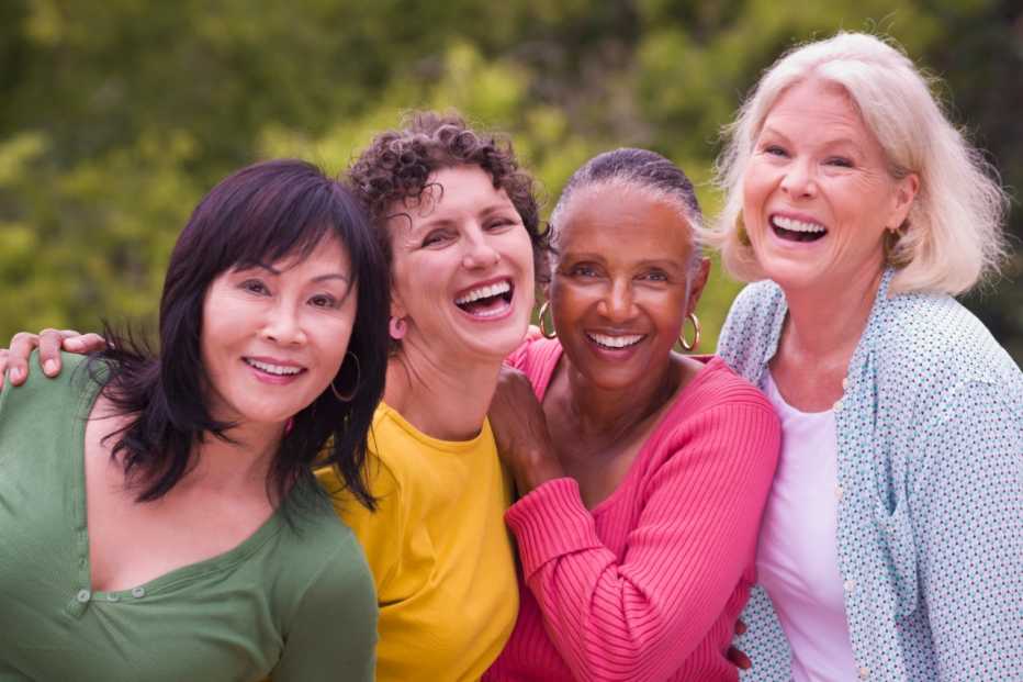 Older women walking together outdoors