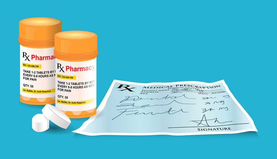 pill bottles next to a prescription drug paper next to it