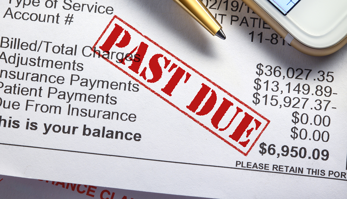 A medical bill with past due on it in red