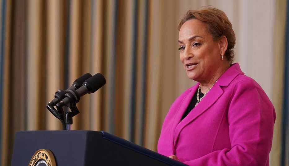 jo ann jenkins speaking at a podium in the white house in october twenty twenty three and an event announcing a new department of labor rule that would help people save for retirement