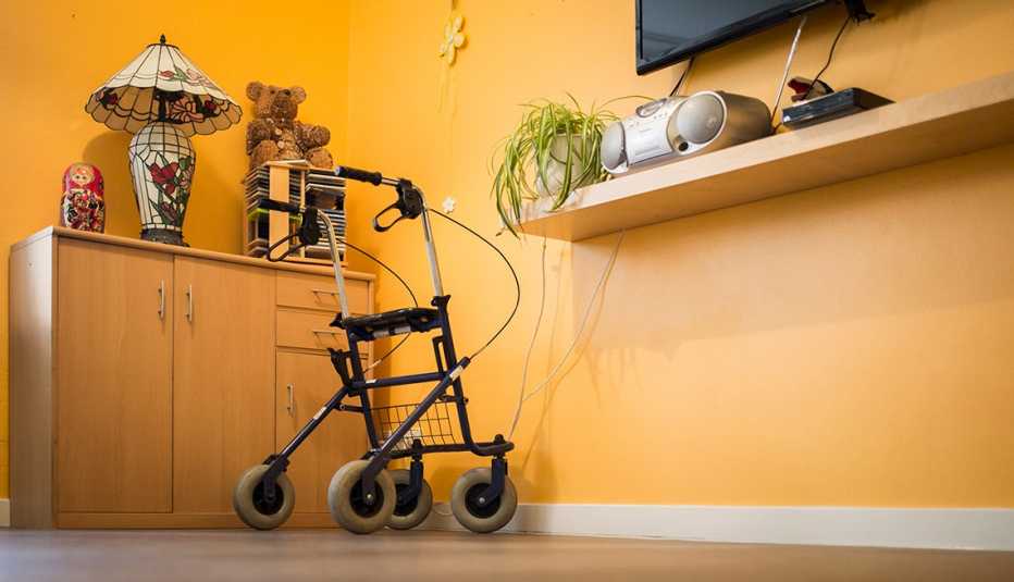 Walker sits in an empty room