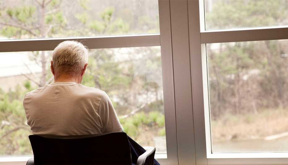 man at window