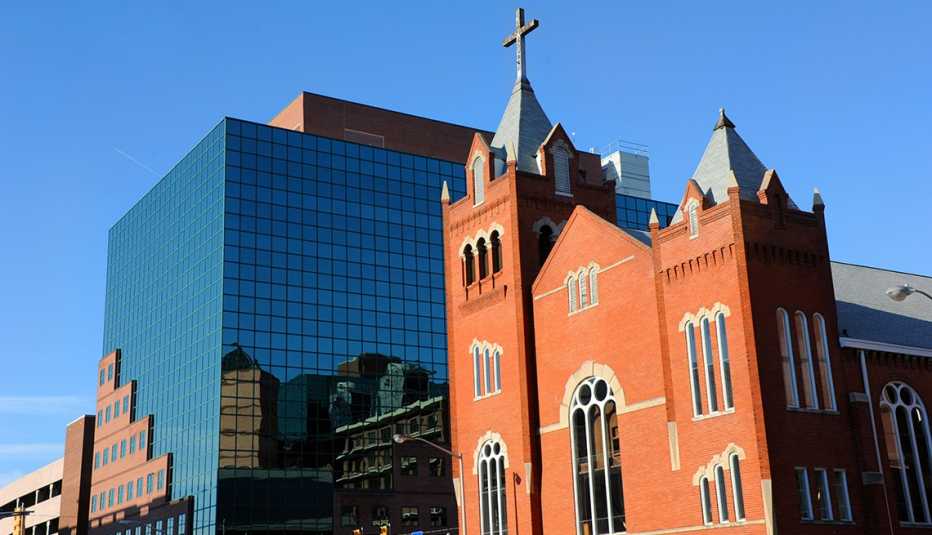 a church next to a building