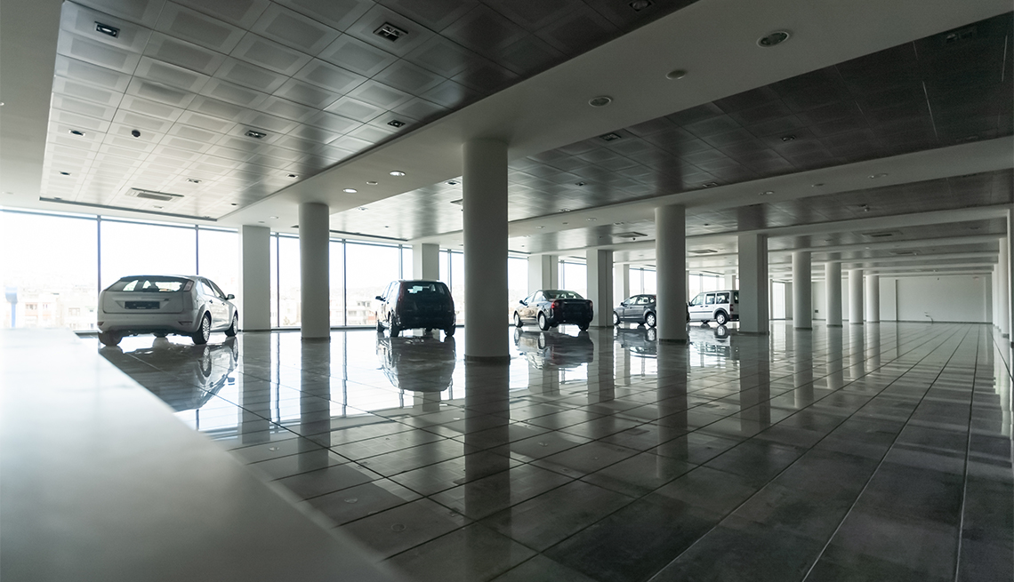 cars parked inside a dealership