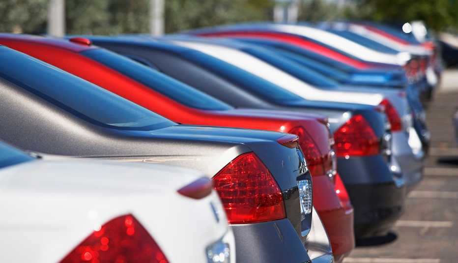 a row of cars on a lot